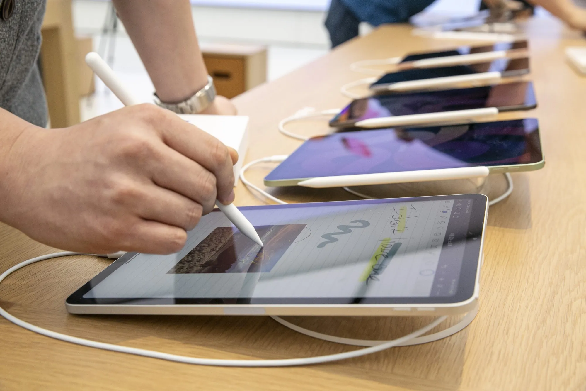 A customer tries an iPad Air at Apple’s Yeouido store in Seoul.