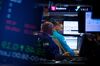Traders work on the floor of the New York Stock Exchange (NYSE) in New York, U.S., on Monday, Nov. 12, 2018. U.S. stocks extended declines as Apple Inc. tumbled on signs of weak iPhone demand and General Electric Co. fell as much as 10 percent.