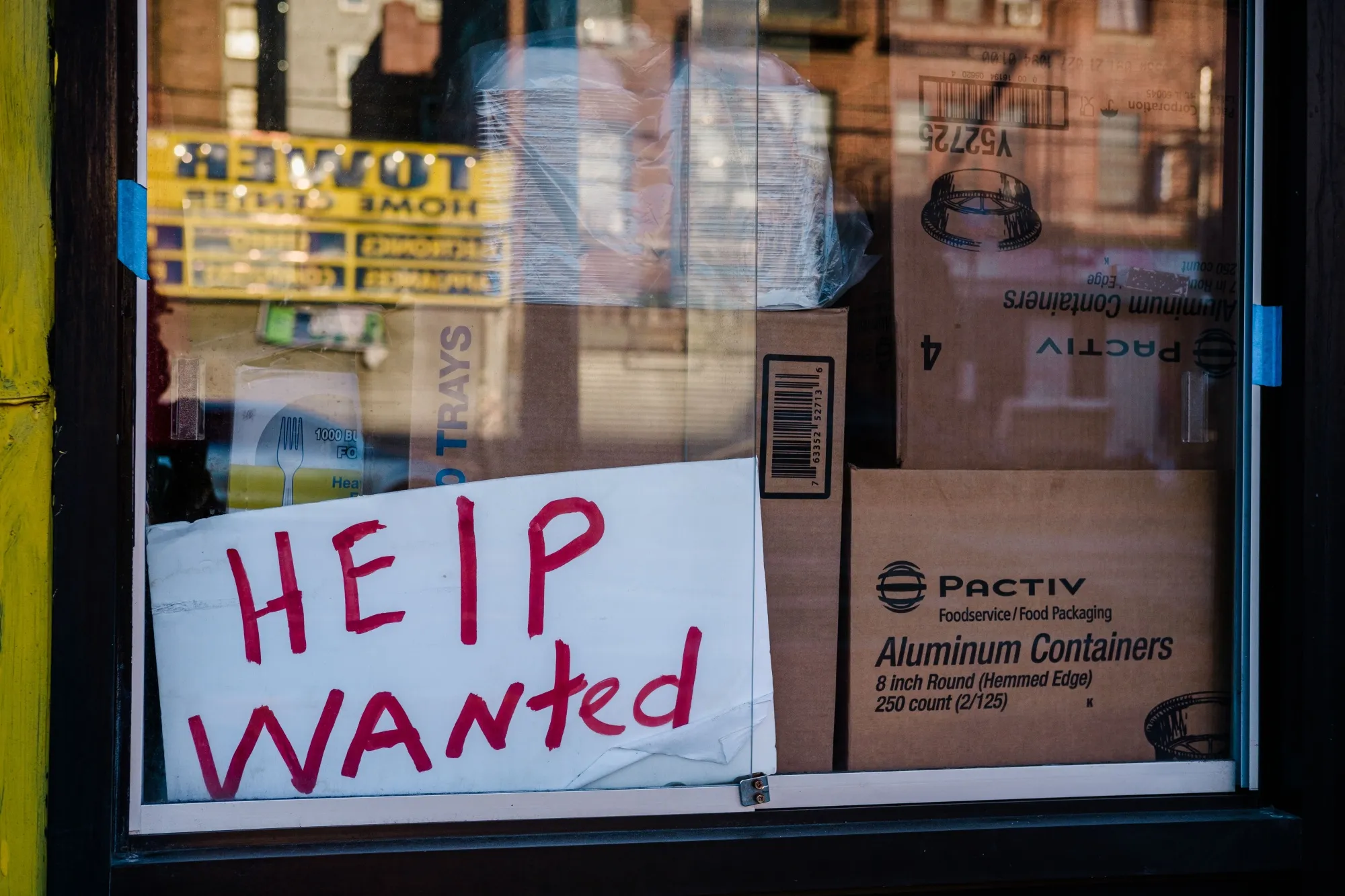 A "Help Wanted" sign outside a restaurant in New York.&nbsp;