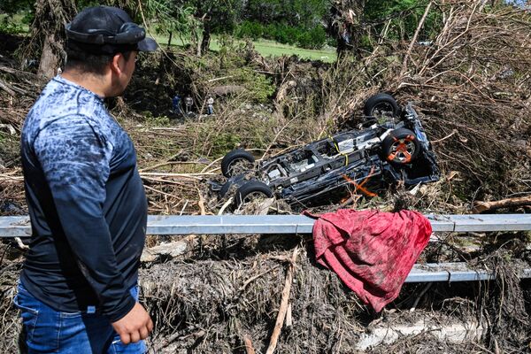 Continuing searches near the Guadalupe River in Hunt, Texas, on July 8.