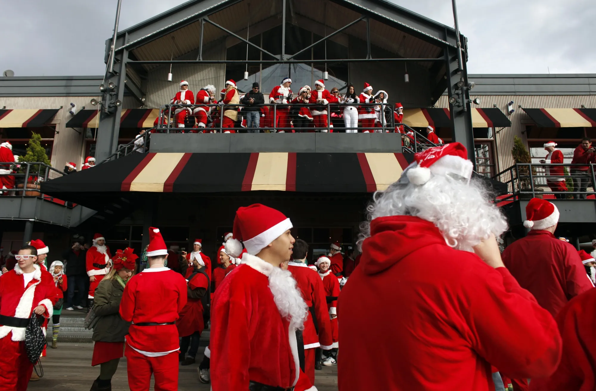 People dressed as Santa Claus during the annual SantaCon event at the South Street Seaport&nbsp;in New York City.&nbsp;