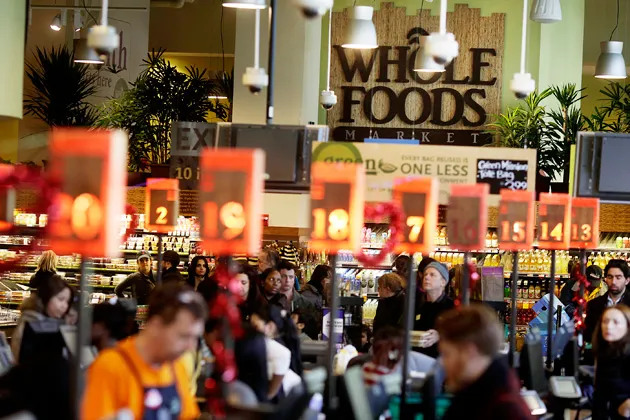 Customers check out at a Whole Foods store in New York