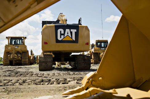 A Caterpillar Inc. excavator sits outside the Altorfer Cat dealership in East Peoria, Illinois.