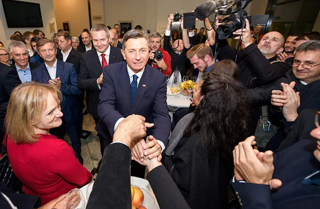 Borut Pahor celebrates with his supporters&nbsp;in Ljubljana on Nov. 12.