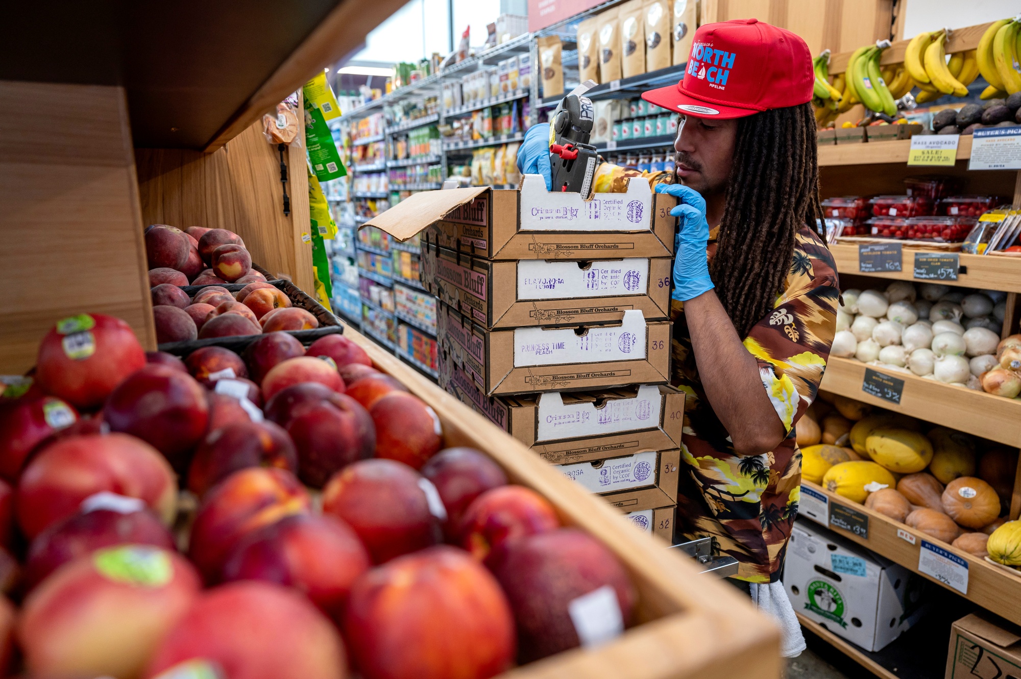 A worker at a grocery store in San Francisco.