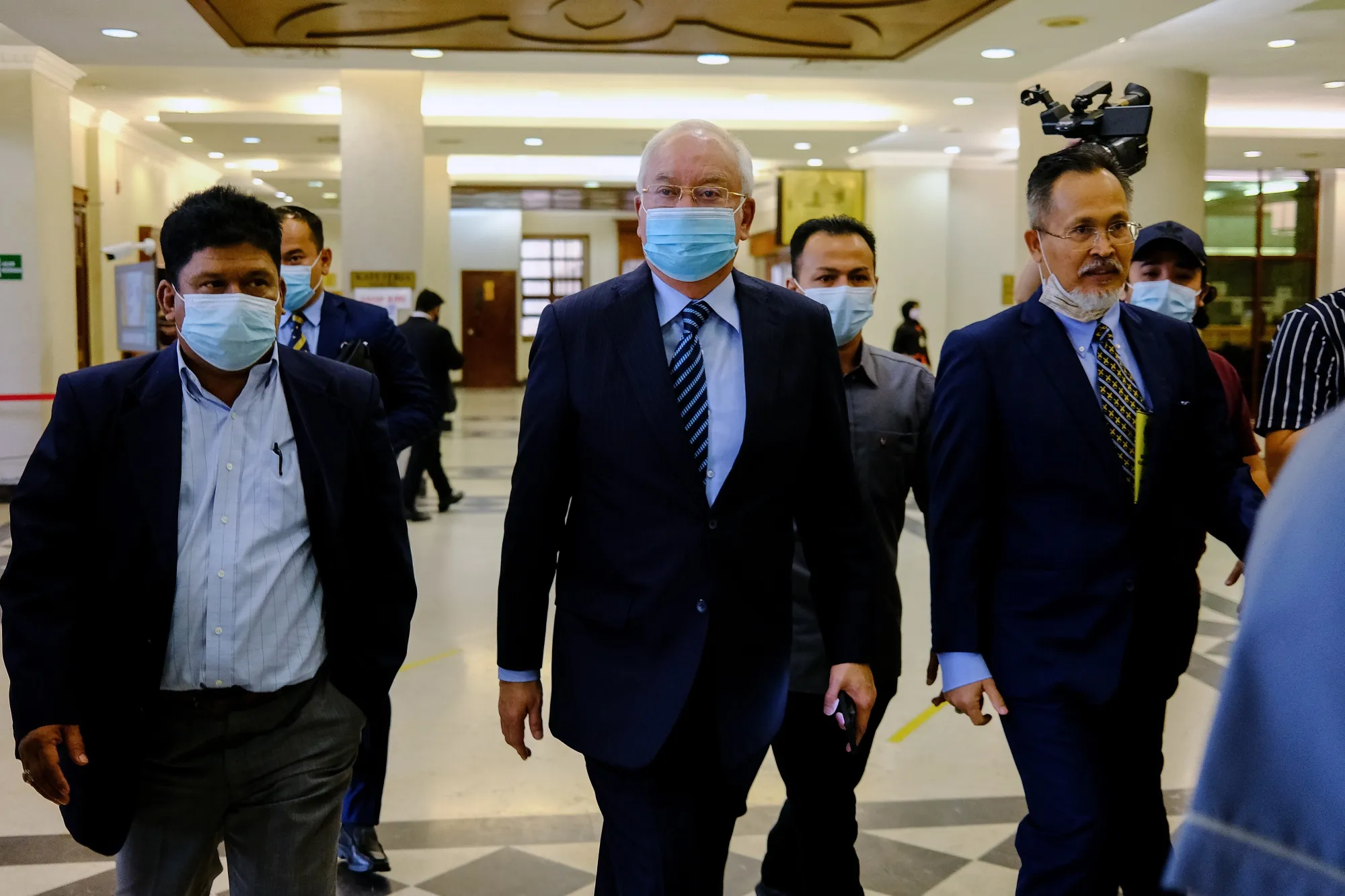 Najib Razak, center, at the Kuala Lumpur Courts Complex in Kuala Lumpur, earlier in January. 