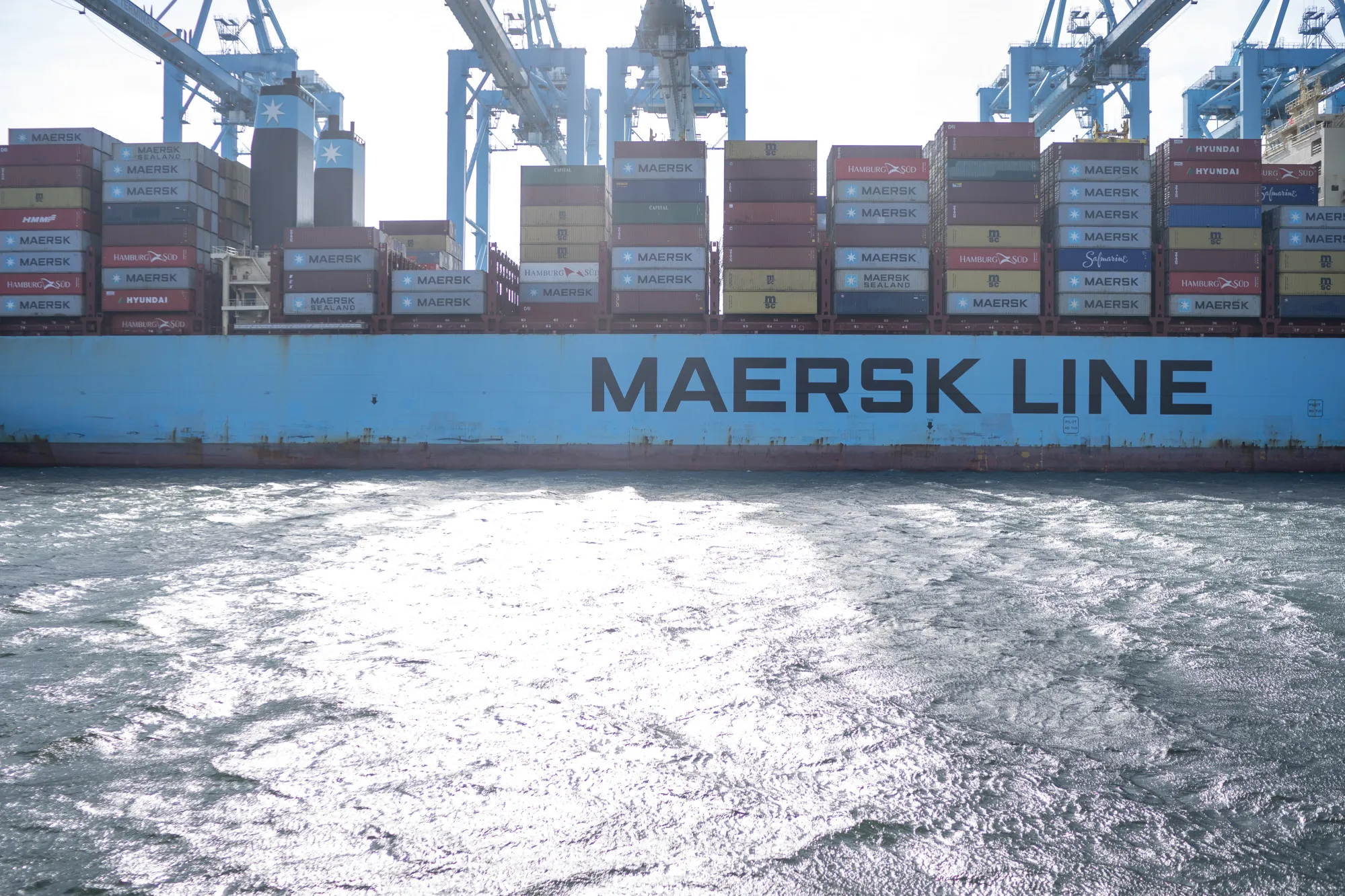 Shipping containers sit on a Maersk Line AS container ship docked at the APM container terminal during a press tour of the Port of Rotterdam in Rotterdam, Netherlands, on Tuesday, Sept. 11, 2018.