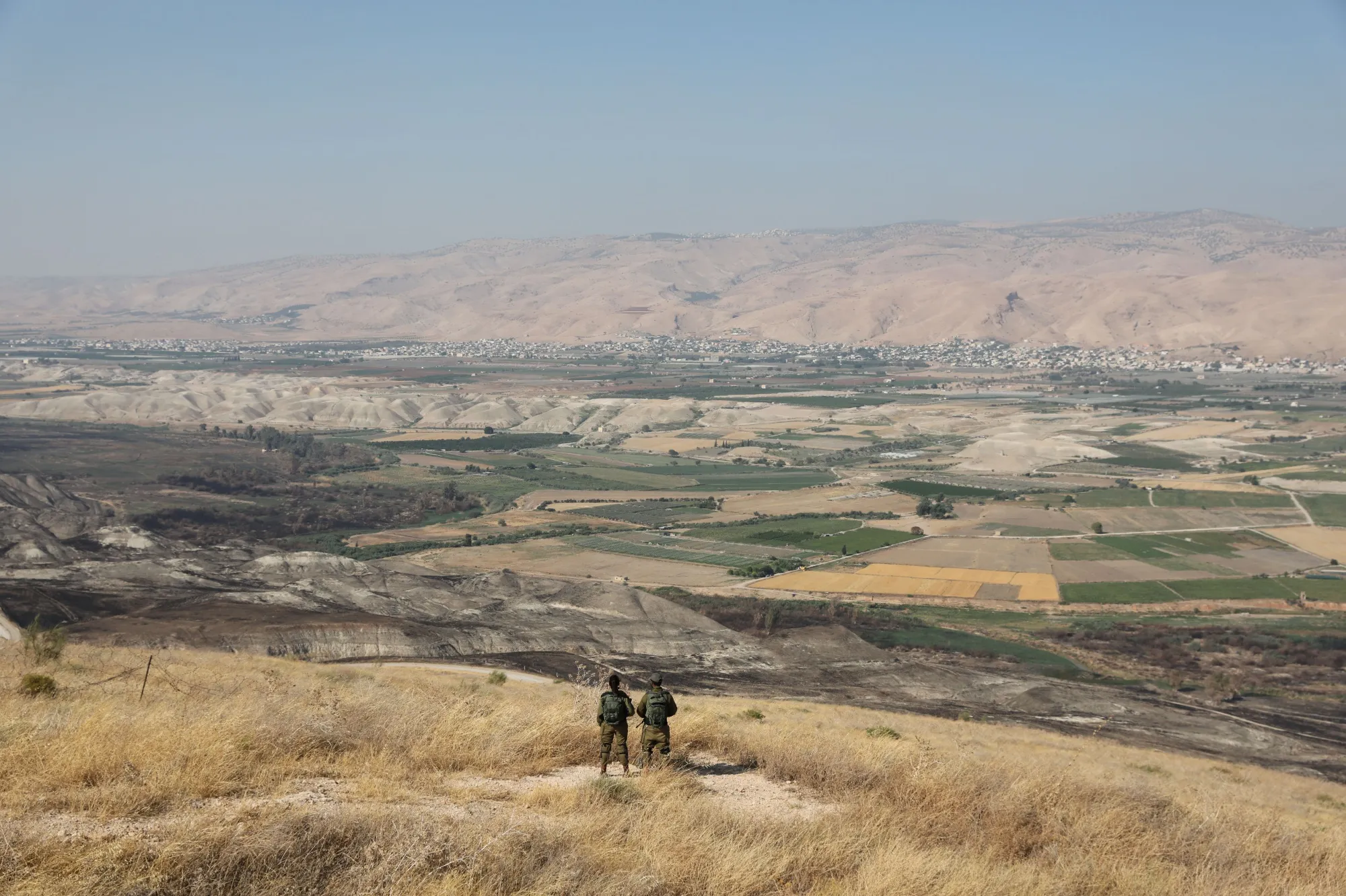 Israeli soldiers overlook&nbsp;the Jordan Valley in 2019.