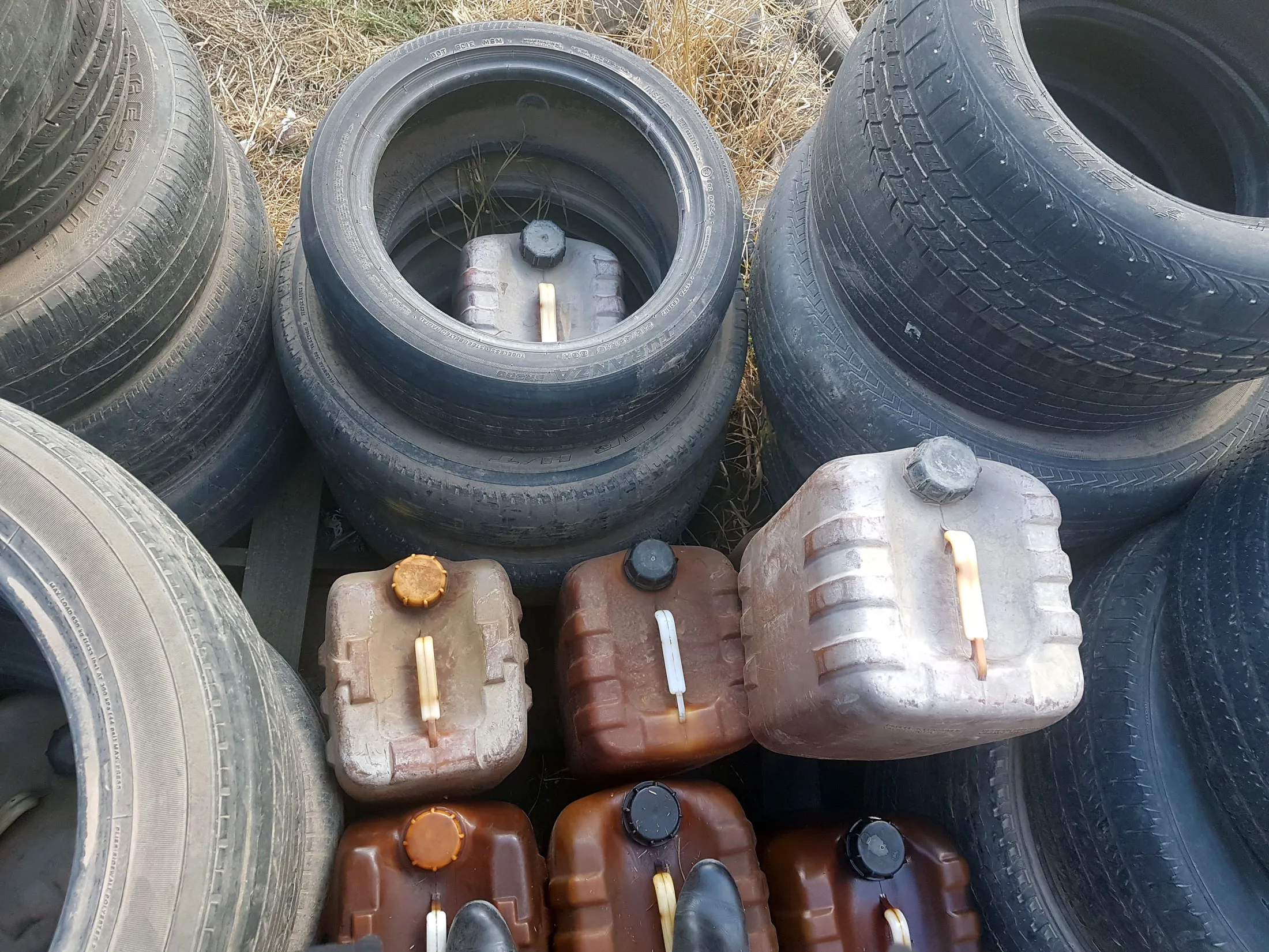 Panchito hides gas cans of stolen fuel inside tires to avoid detection.