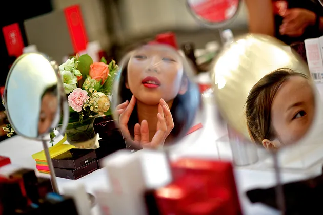 Women at a training camp for beauty pageants in Beijing