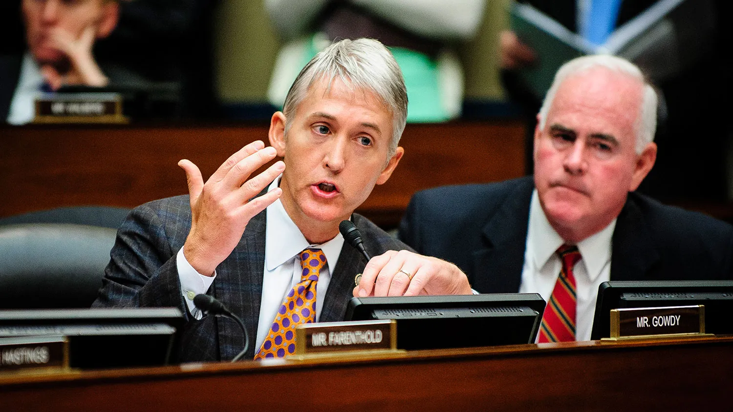 Representative Trey Gowdy, a Republican from South Carolina, left, objects to Lois Lerner's, the director of the Internal Revenue Service's (IRS) exempt organizations office, unseen, refusal to answer questions, during a House Oversight and Government Reform Committee hearing in Washington, D.C., U.S., on Wednesday, May 22, 2013.
