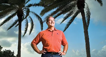 Billionaire banker Stanford in Antigua, where his firm benefits from low taxes 