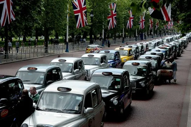 Parked taxis block the Mall leading to Buckingham Palace on June 11
