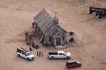 This aerial photo shows the Bonanza Creek Ranch in Santa Fe, N.M., on Saturday, Oct. 23, 2021. The person in charge of weapons on the movie set at the ranch where actor Alec Baldwin fatally shot cinematographer Halyna Hutchins said Wednesday night, Nov. 3 that she suspects someone put in a live bullet in the prop gun that Baldwin shot. (AP Photo/Jae C. Hong, File)