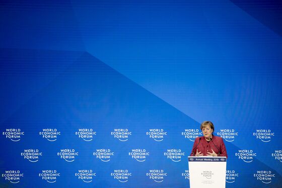 Merkel Calls for Swift Return to ‘Normal’ Monetary Policy