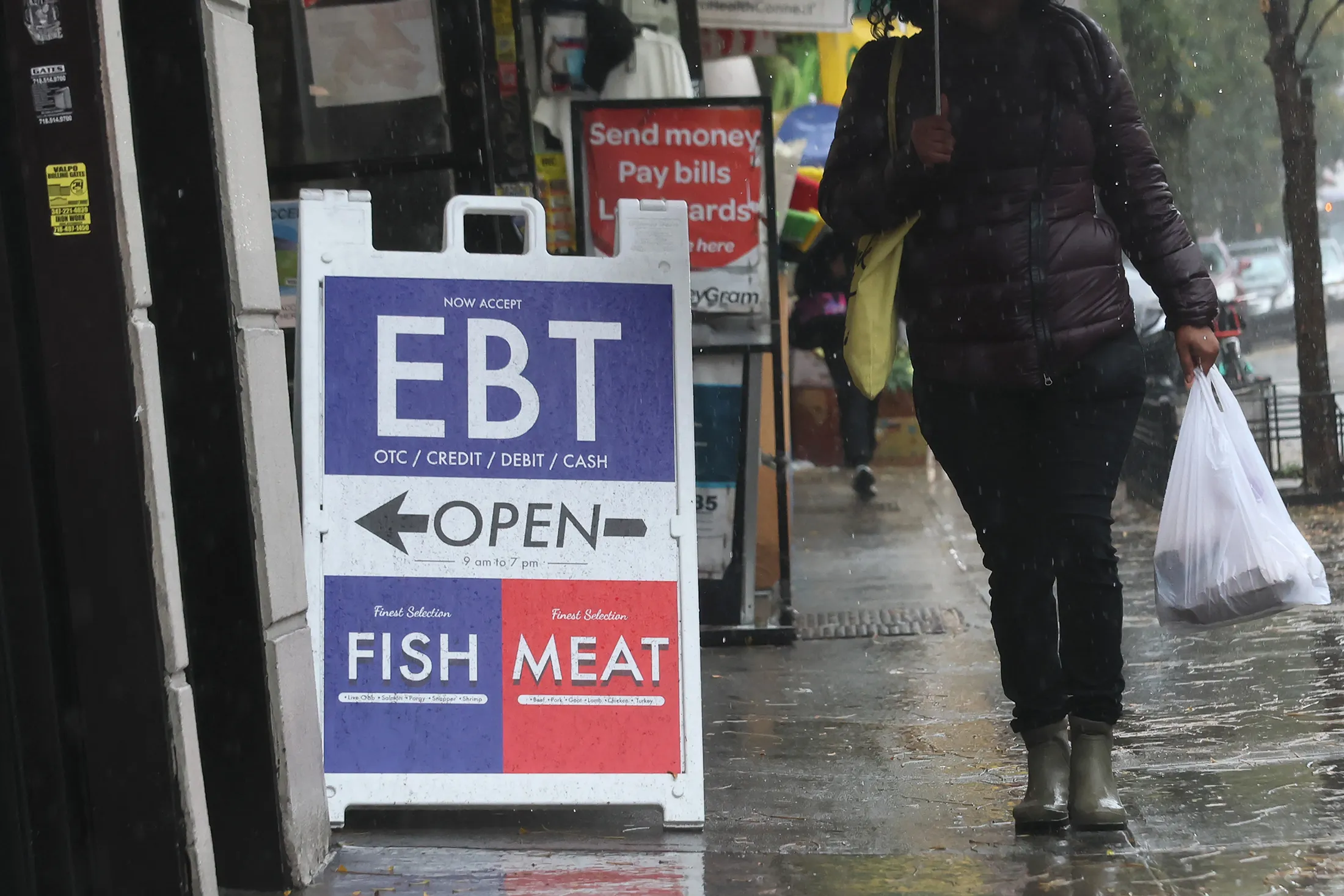 An EBT sign is displayed at a grocery store in the Flatbush neighborhood of New York on Oct.&nbsp;30.