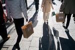 Shoppers in Tokyo. Photographer: Ko Tsuchiya/Bloomberg