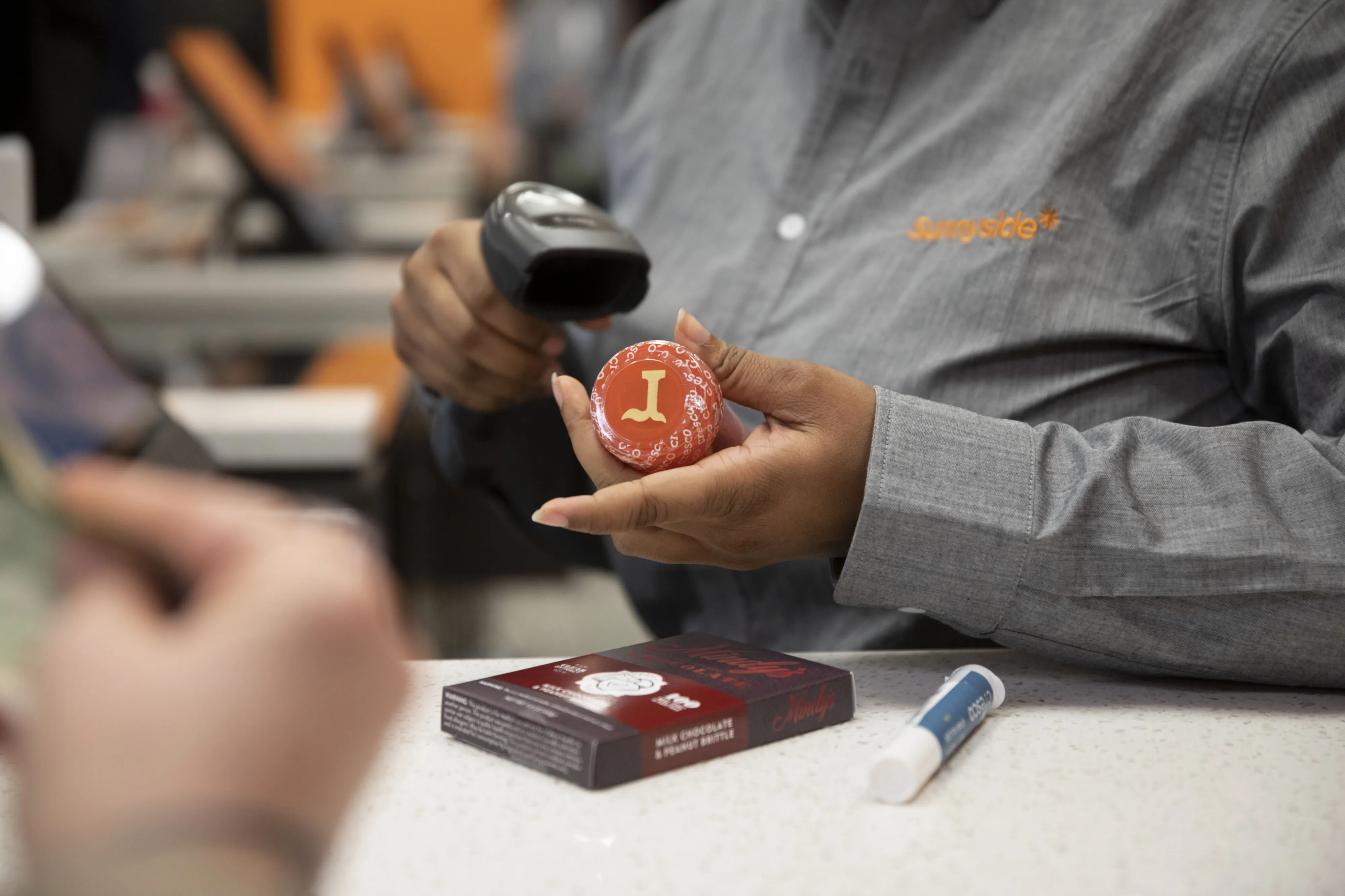 A marijuana product is rung up at Cresco Labs Sunnyside* Lakeview dispensary in Chicago.