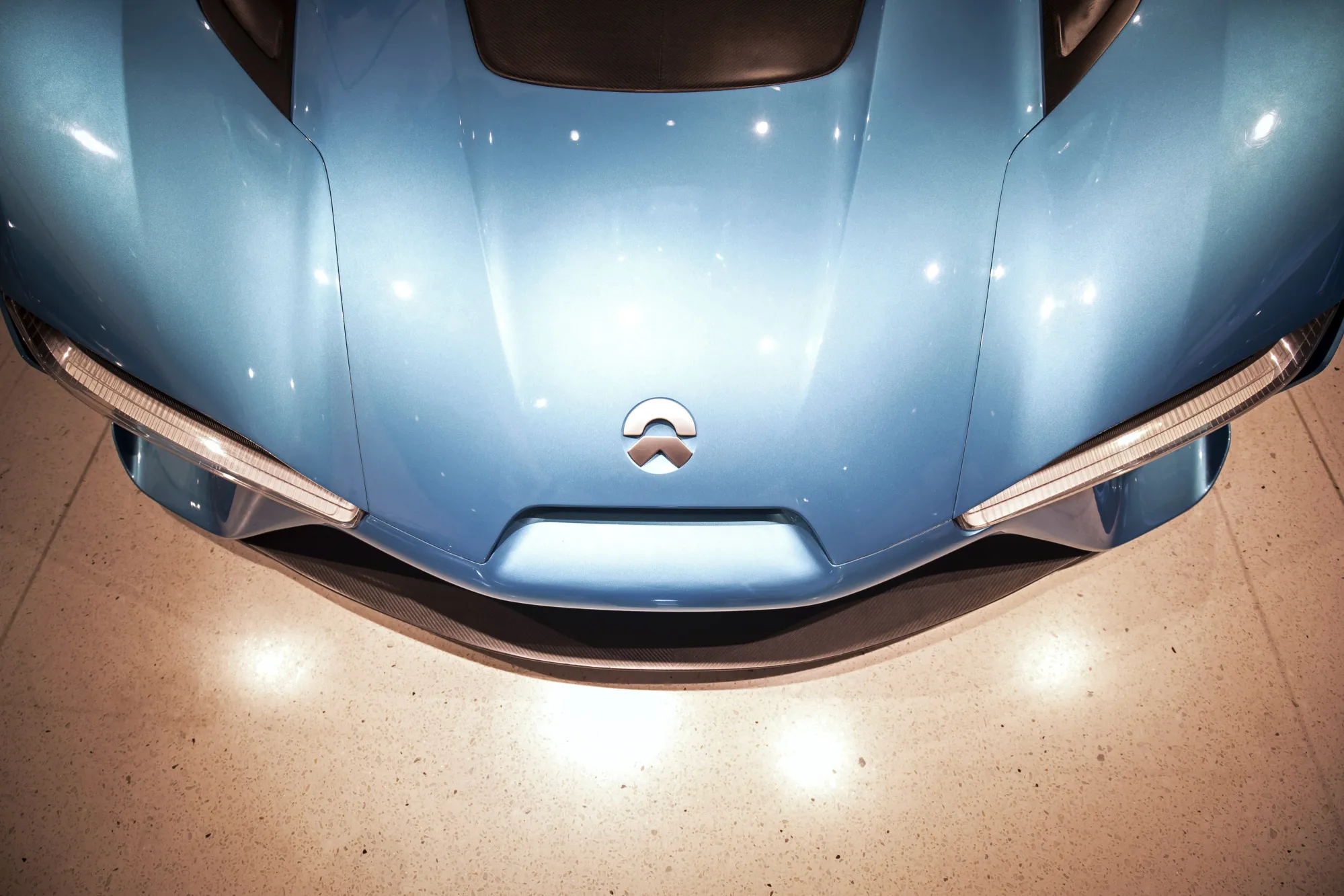 A NIO&nbsp;Inc. EP9 sports car stands on display inside the Nio House showroom at the Shanghai Tower in Shanghai.