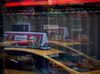 Monitors display stock market information at the Nasdaq MarketSite in the Times Square neighborhood of New York.