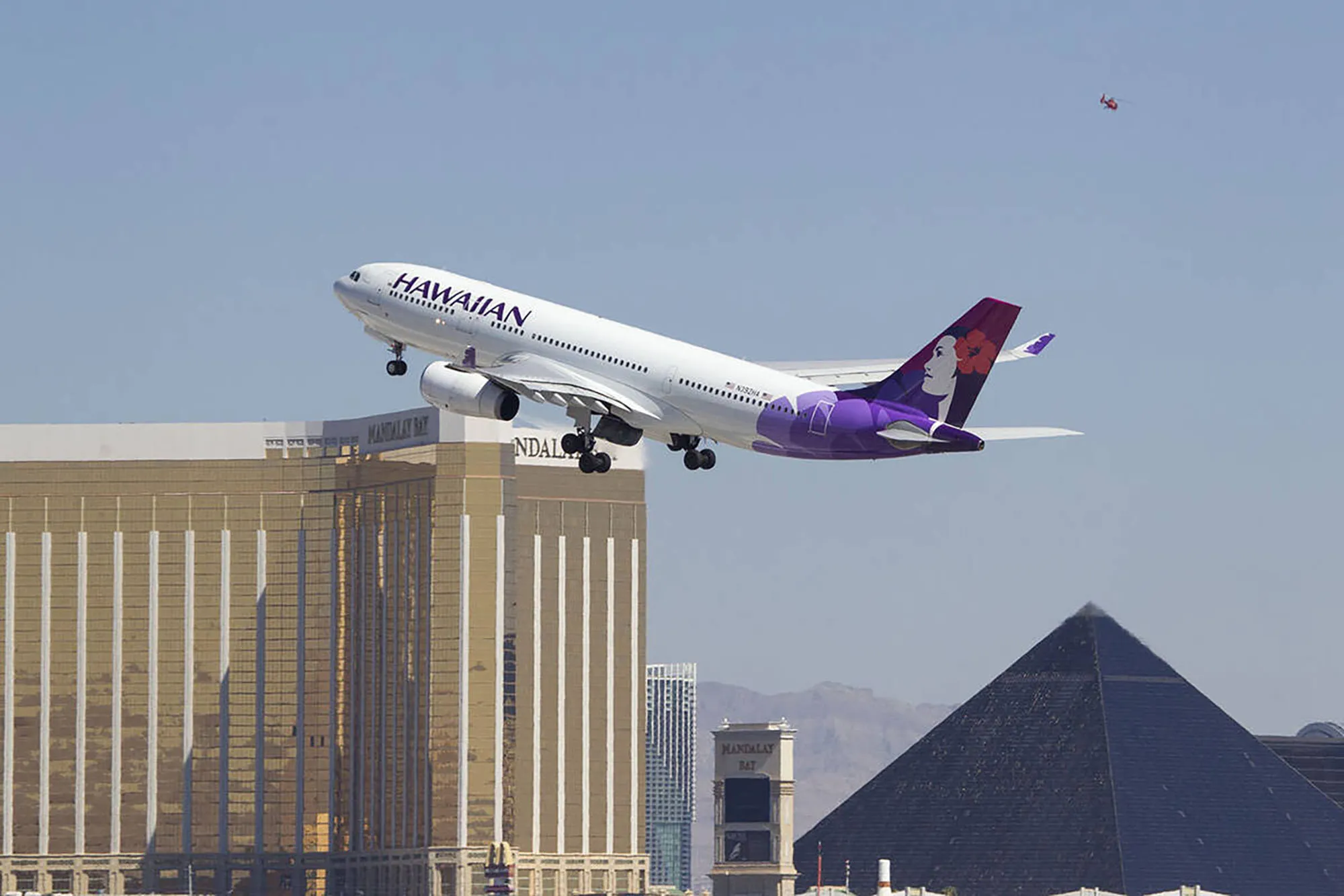 A Hawaiian Airlines jetliner departs from Las Vegas.