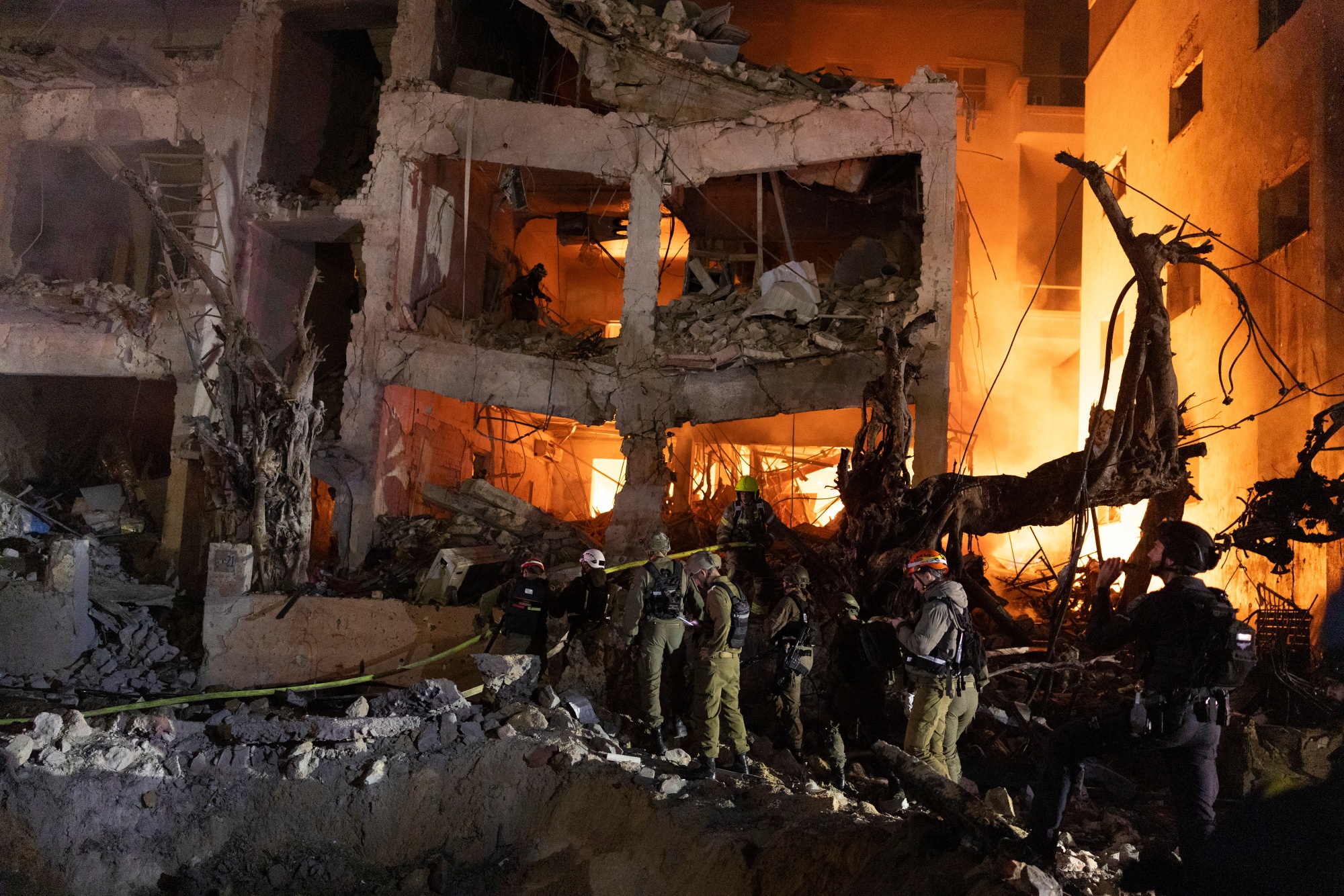 A building hit by an Iranian missile strike in Tel Aviv, Israel, on Feb. 28. Photographer: Kobi Wolf/Bloomberg