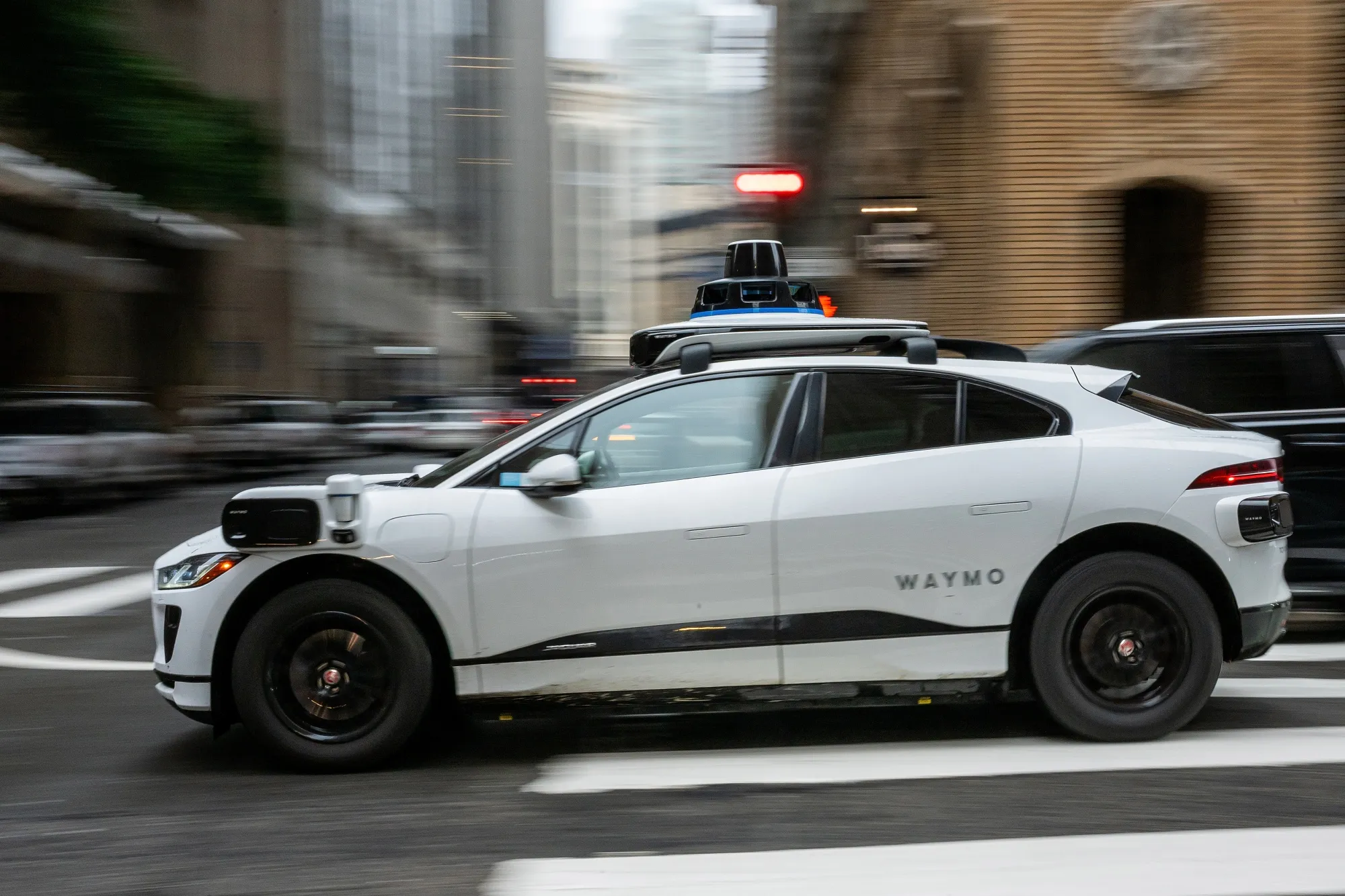 A Waymo autonomous taxi on Bush Street in San Francisco, California, US.