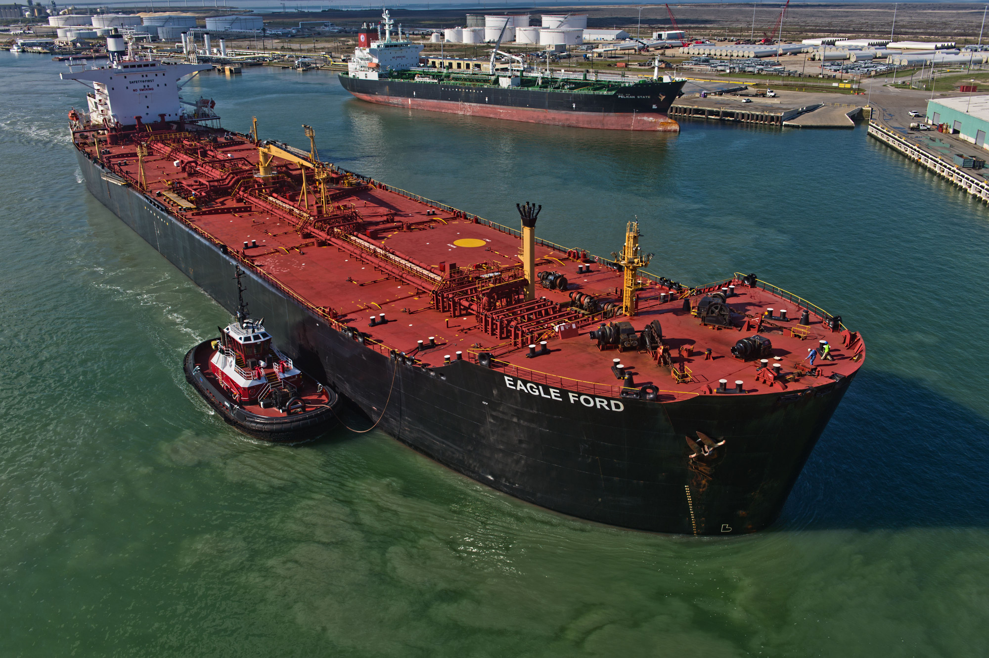 Views Of Tankers & Refineries As Oil Trades Near 12-Year Low