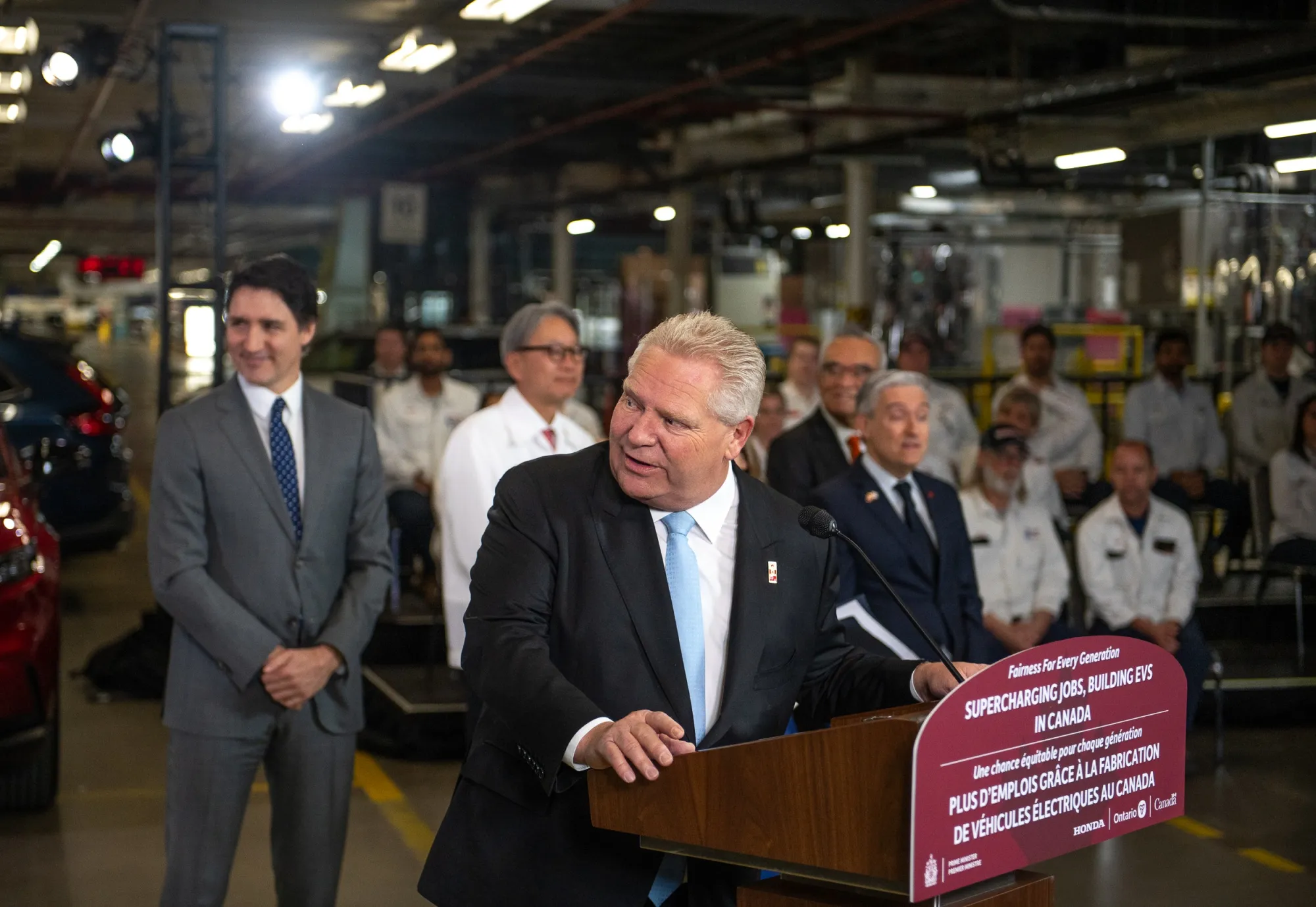 Doug Ford speaks alongside Justin Trudeau at a Honda plant in Alliston, Ontario on April 25.