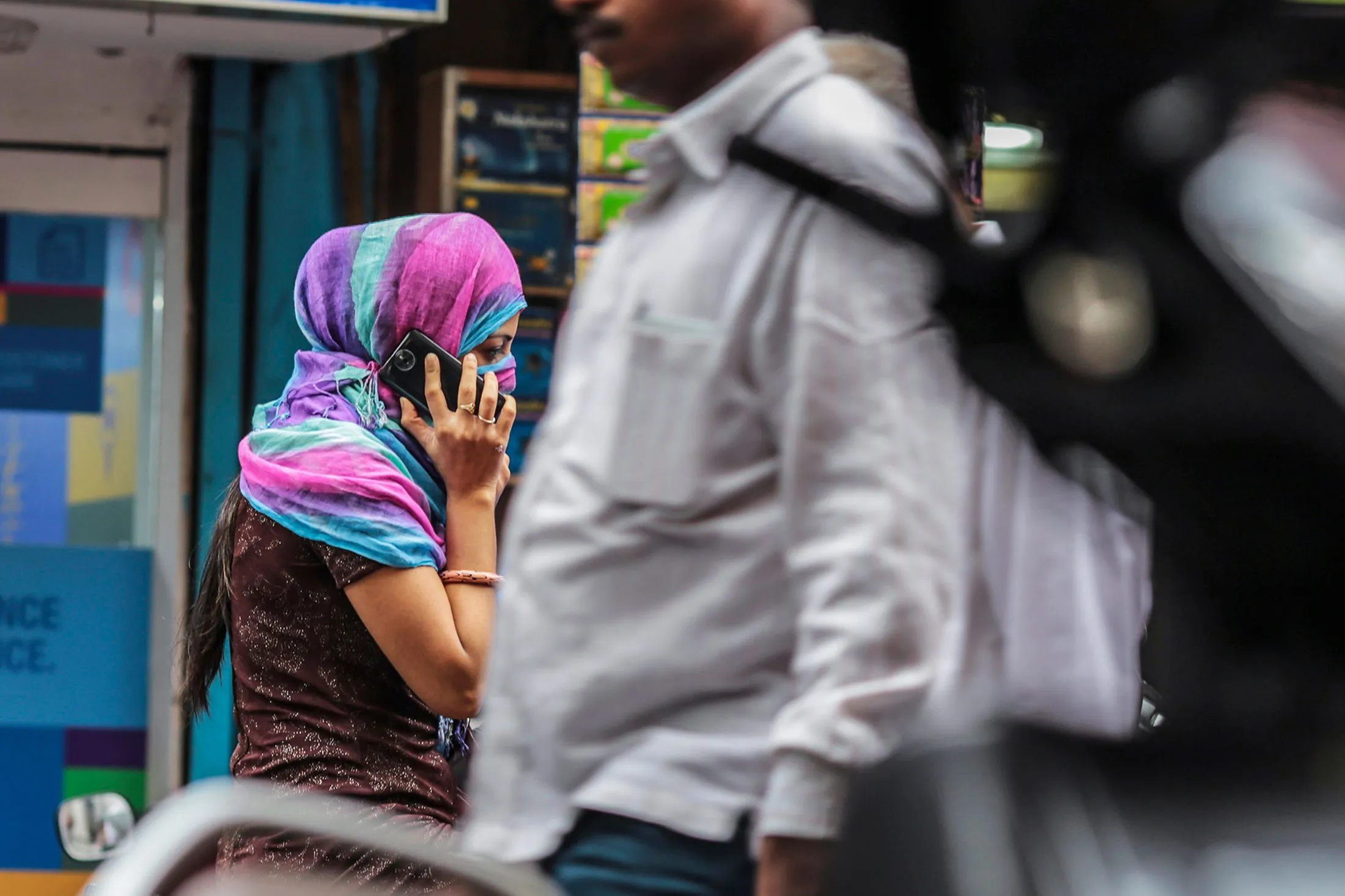A woman talks on a mobile phone in Mumbai, India, on Feb. 28, 2015.
