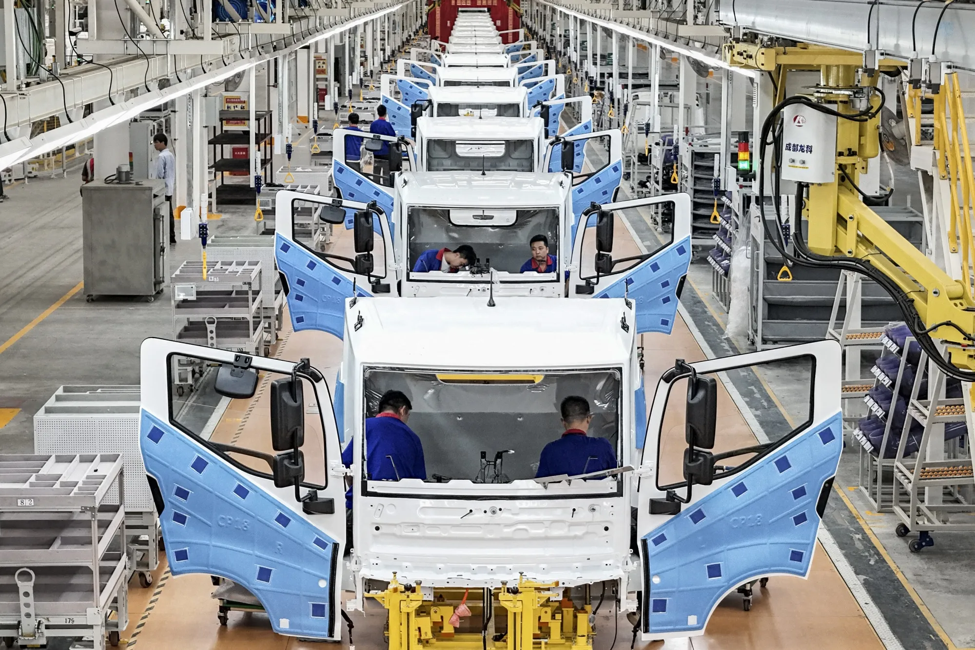 Employees work on the&nbsp;assembly line at a BYD factory in Huai'an, China.