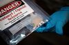An evidence bag containing 16.4 grams of heroin (likely cut with fentanyl according to an undercover detective present when the photo was taken) is seen at the Volusia County Sheriff's Office Evidence Facility in Daytona Beach, Florida, US, on Monday, Sept. 12, 2022. The drugs were confiscated in a recent drug bust.