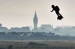 Franky Zapata flies past the city hall of Calais.