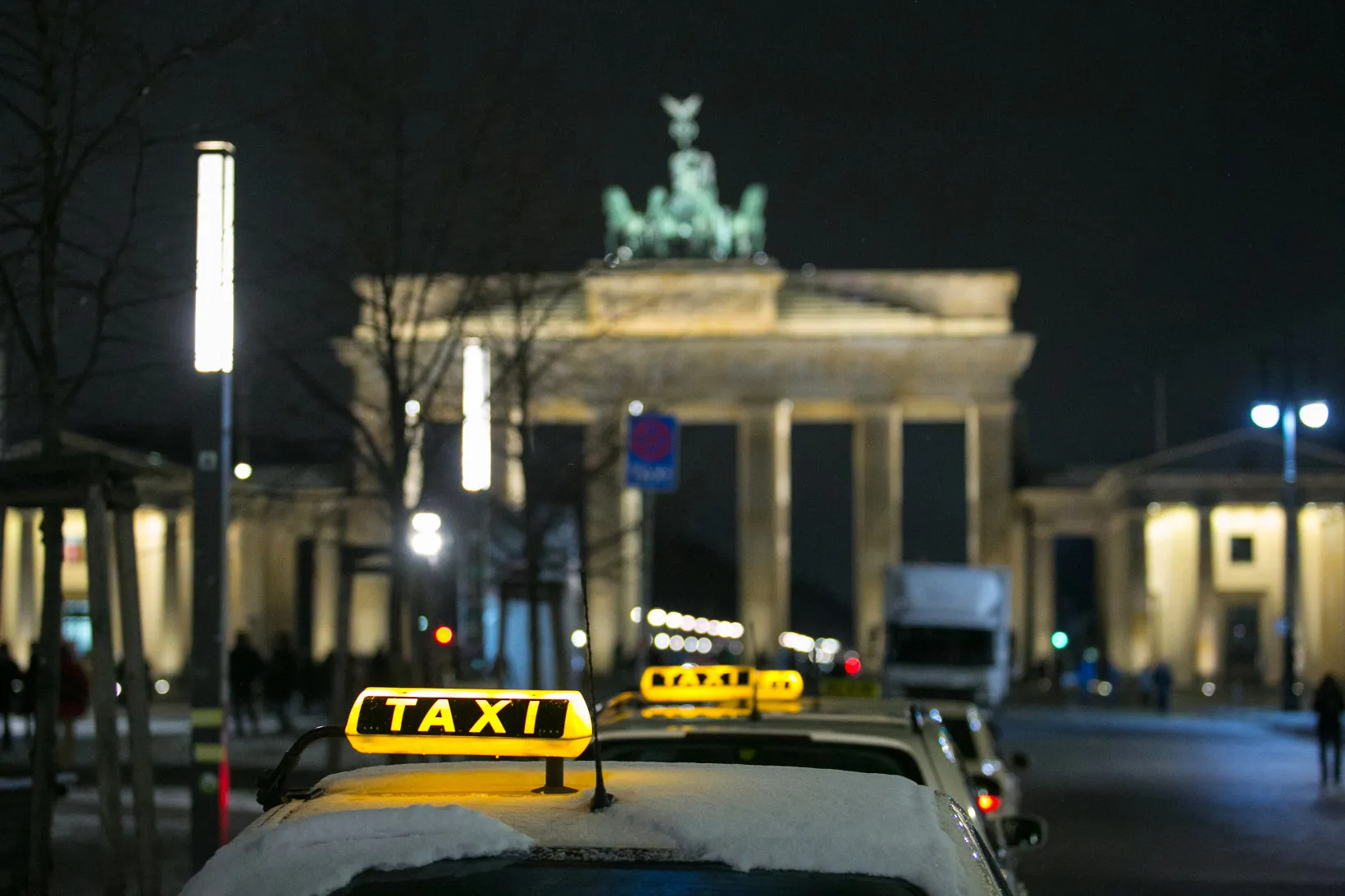 Taxis near the Brandenburg Gate, in Berlin.