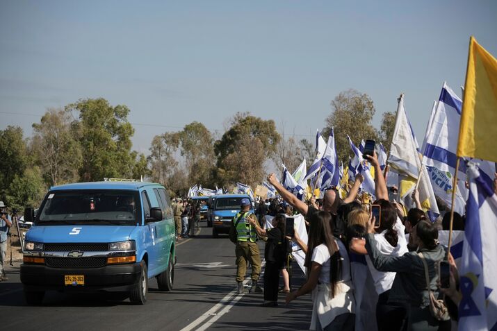 A convoy carrying hostages released from Gaza