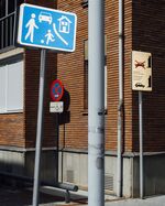 A sign in Vitoria-Gasteiz alerts drivers to the pedestrian paradise ahead.