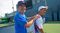 John McEnroe with 16-year-old Rubin at Sportime on Randall’s Island in New York on Aug. 21, 2012.