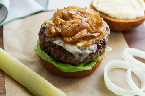 Perfection may take a while, but this beefy burger with sweet-and-sour onions is worth it.