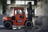 A worker operates a forklift moving copper plates at the Jinguan Copper smelter, operated by Tongling Nonferrous Metals Group Co., in Tongling, Anhui province, China, on Thursday, Jan. 17, 2019. On the heels of record refined copper output last year, China's No. 2 producer, Tongling, says it'll defy economic gloom and strive to churn out even more of the metal in 2019.