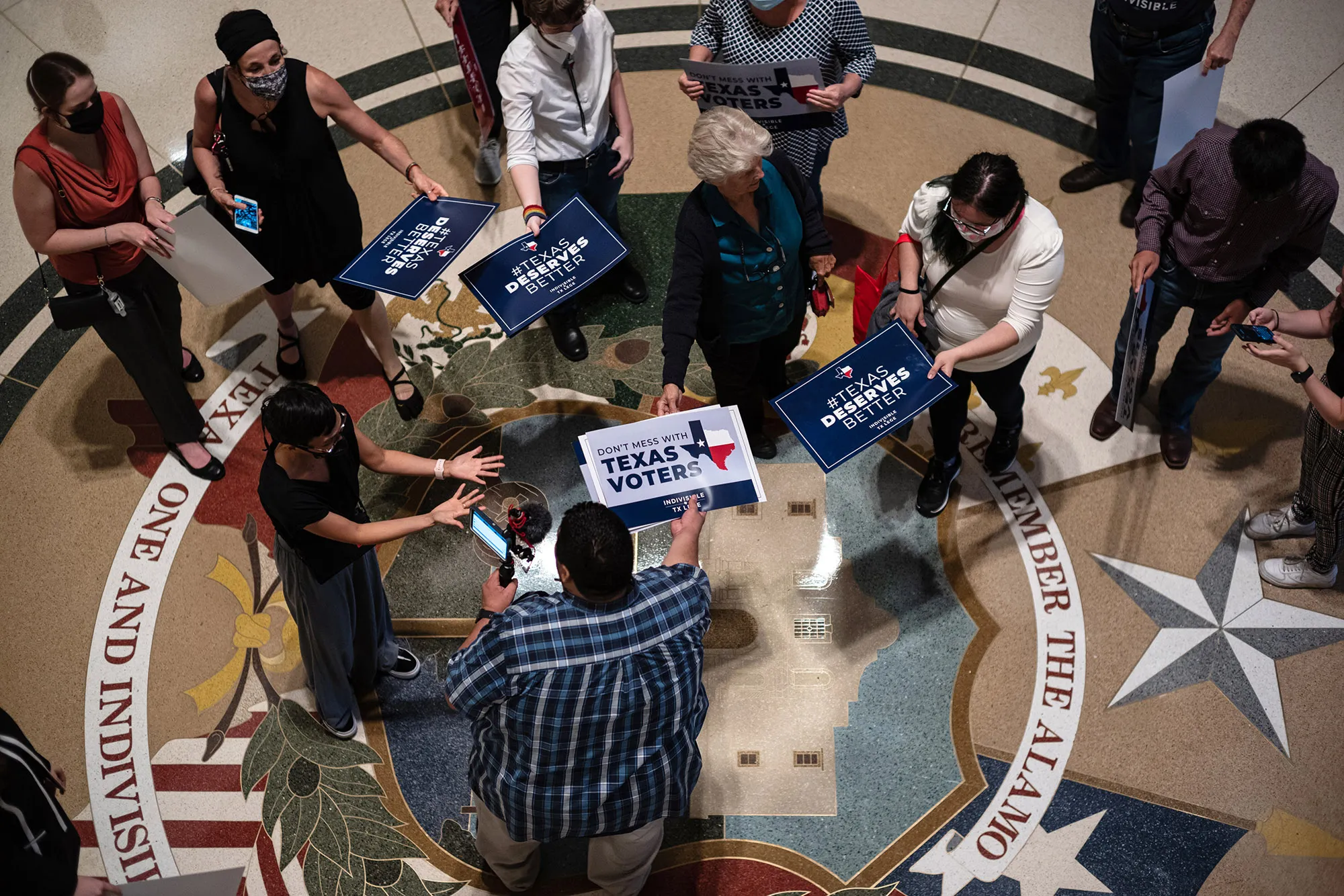 Opponents of the Texas Republican effort to pass new voting restrictions gather at the State Capitol in Austin as they wait to testify on July 10.