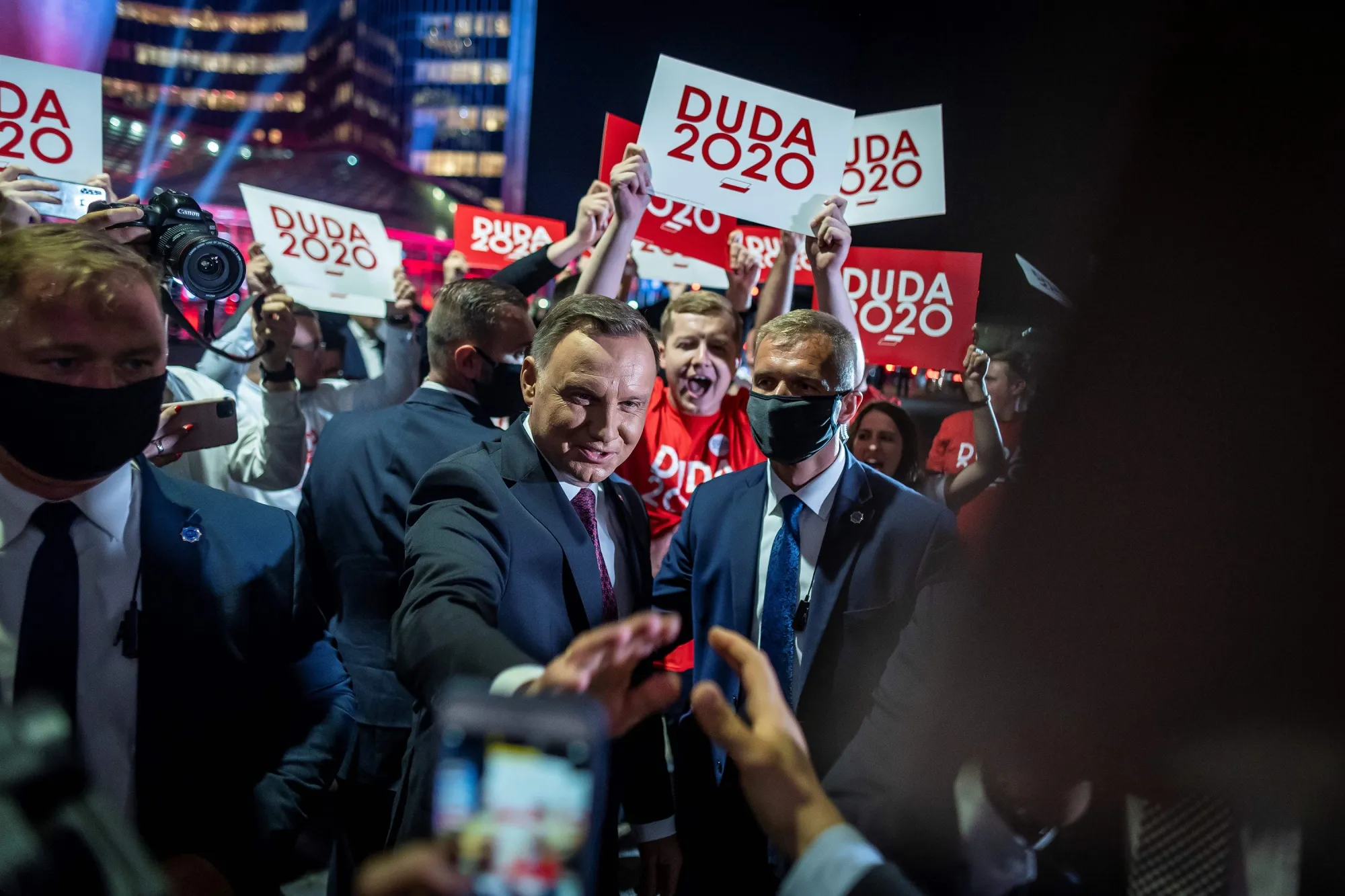 Supporters greet Andrzej Duda in front of the Polish Television headquarters in Warsaw on June 17.