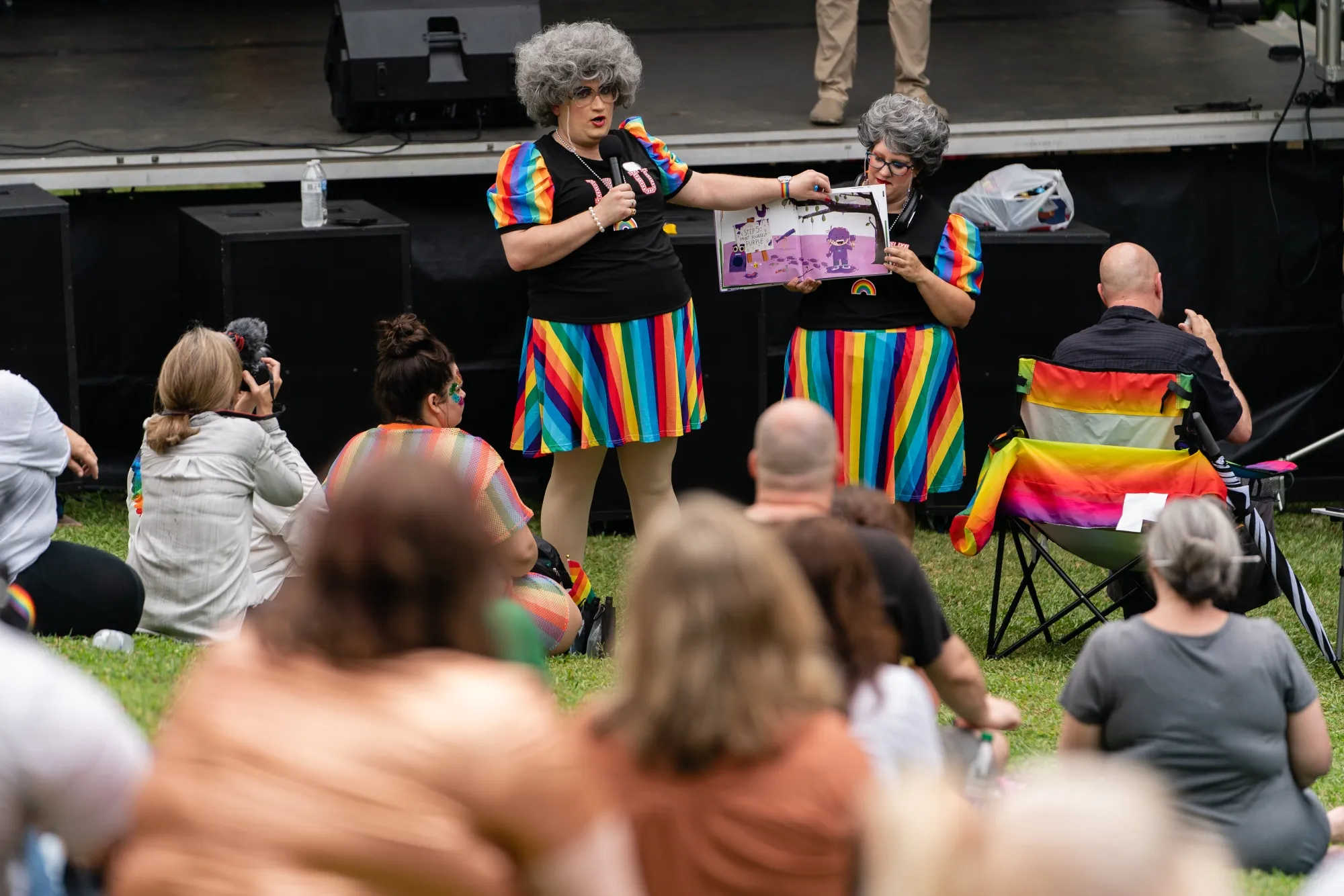 Camilla Carter, left, reads a children's book&nbsp;during a drag story hour&nbsp;in Georgia