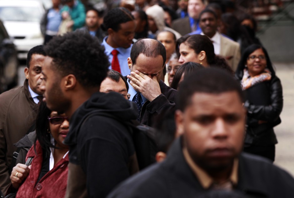 Jobseekers wait in line for the Dr. Martin Luther King Jr. career fair in New York, in April 2012. 