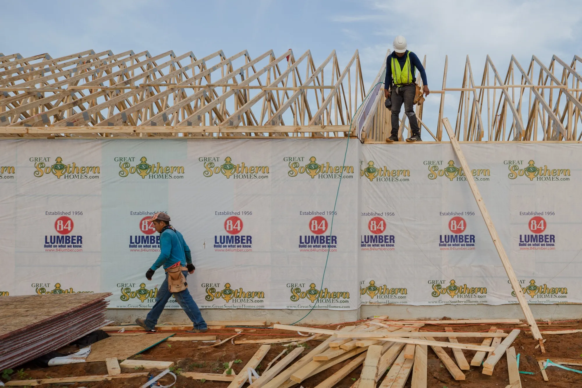 Contractors work on a home in Sumter, South Carolina.