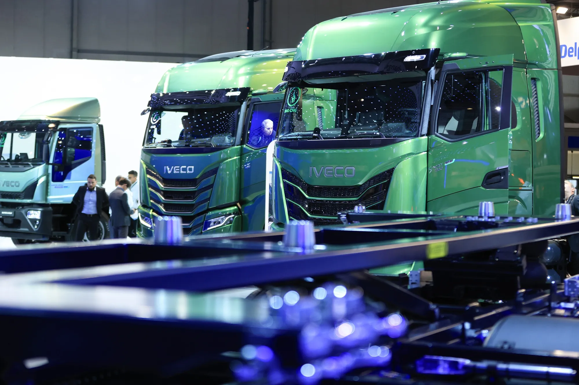 Trucks on the Iveco Group NV booth at the IAA Transportation fair in Hannover, Germany.