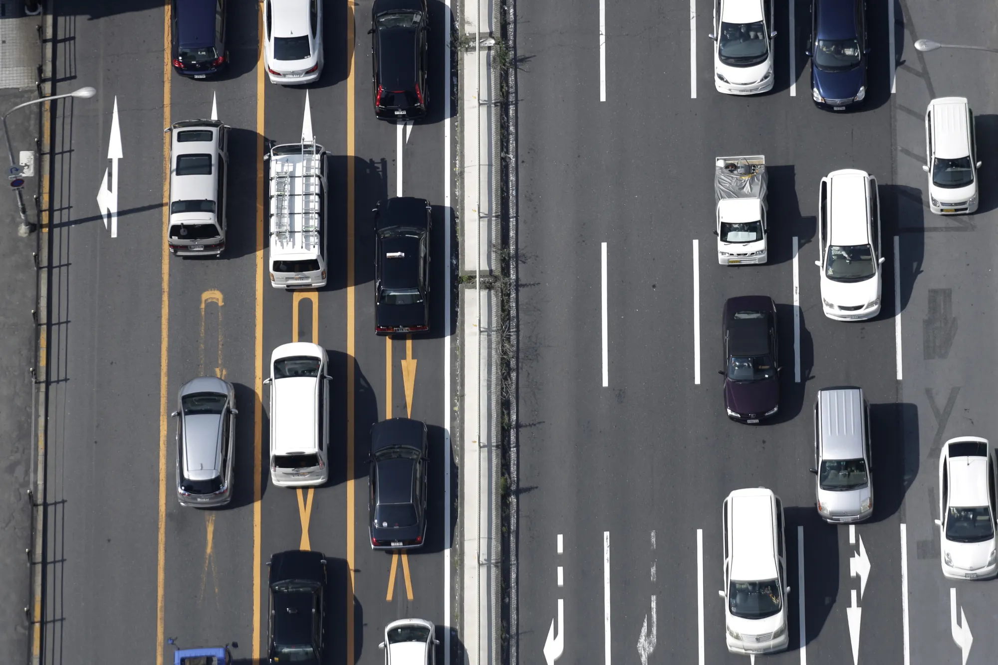 Traffic travels on roads in Osaka, Japan, on Saturday, June 18, 2016. Japanese shares headed for their first decline in four days on thin volumes ahead of the U.K. vote on whether to stay in the European Union.