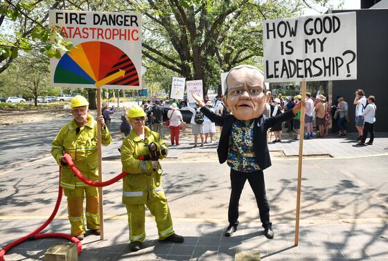 Fires, Scandal, Slowdown Pose Triple Threat to Australia PM