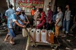 People purchase cooking oil in Surabaya, in Indonesia.