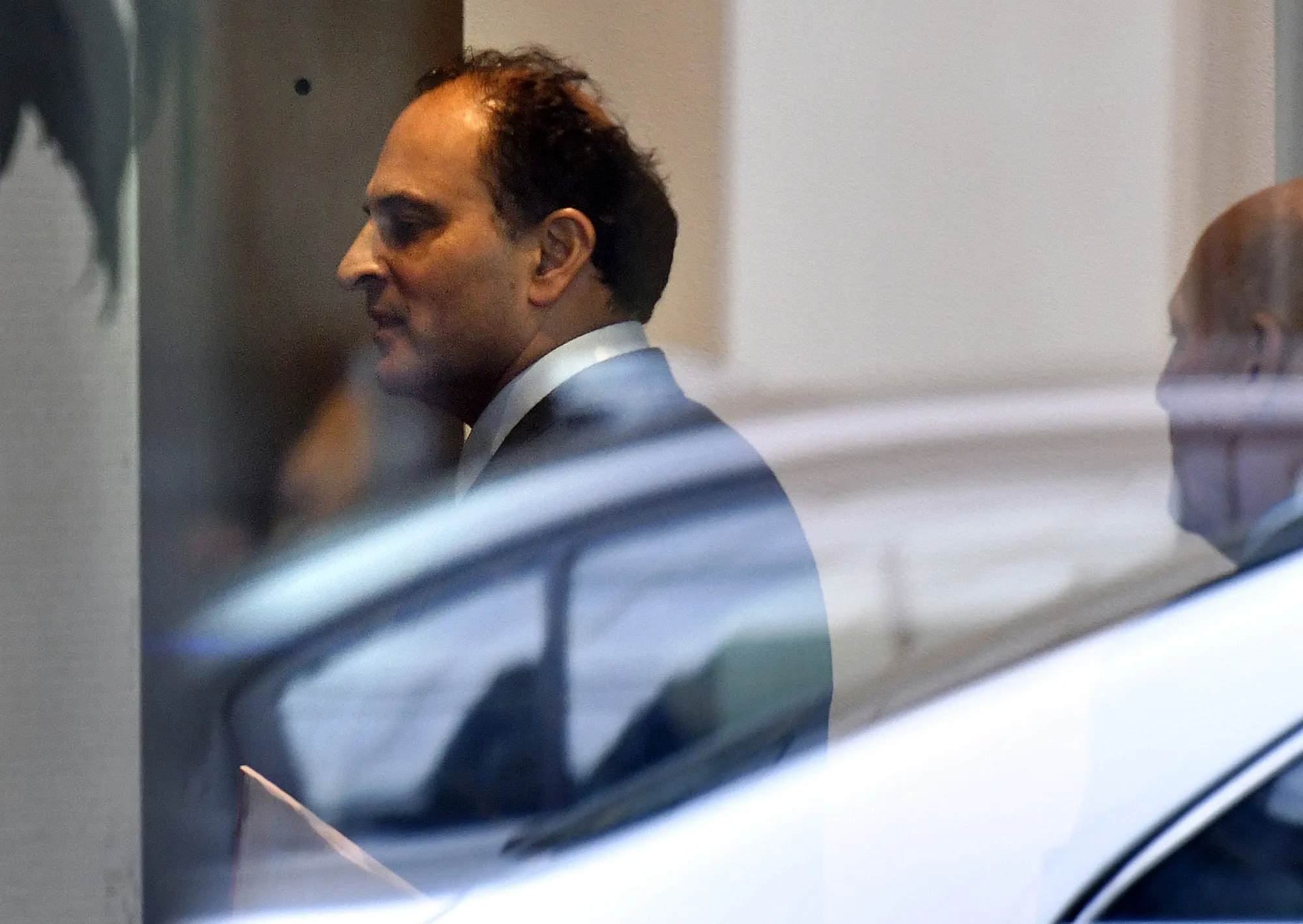 David Sidoo outside court with his lawyer following a hearing in Boston, on March 15.