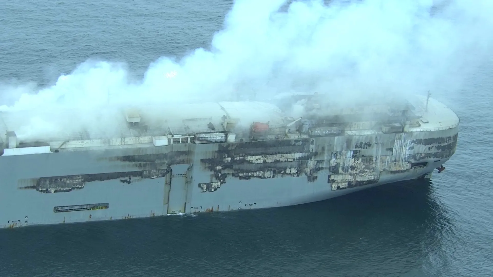 Smoke rises from the fire-damaged Fremantle Highway vessel on July 28.